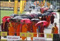 Monks walking from YMBA towards BMICH
