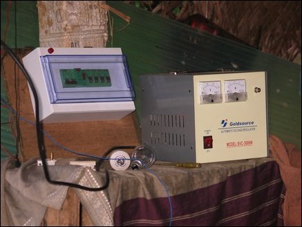 Overload protector switches and a Voltage regulator which serve as the gateway to the supply network are mounted inside his hut. Since power output is manually controlled Radhakrishnan estimates the power need and sets the water flow to the 'desired' level so that the voltage stabilizer is given sufficient range to operate.