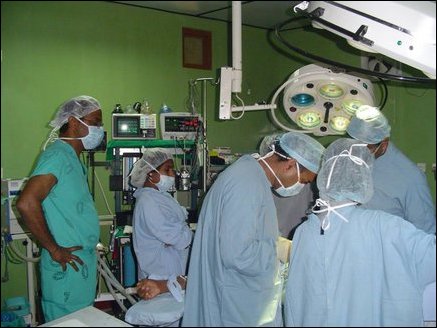 Dr Ganenthiran, an anaesthesiologist, helping in a surgery at the hospital.