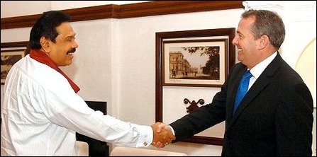 Fox shakes hands with Rajapaksa